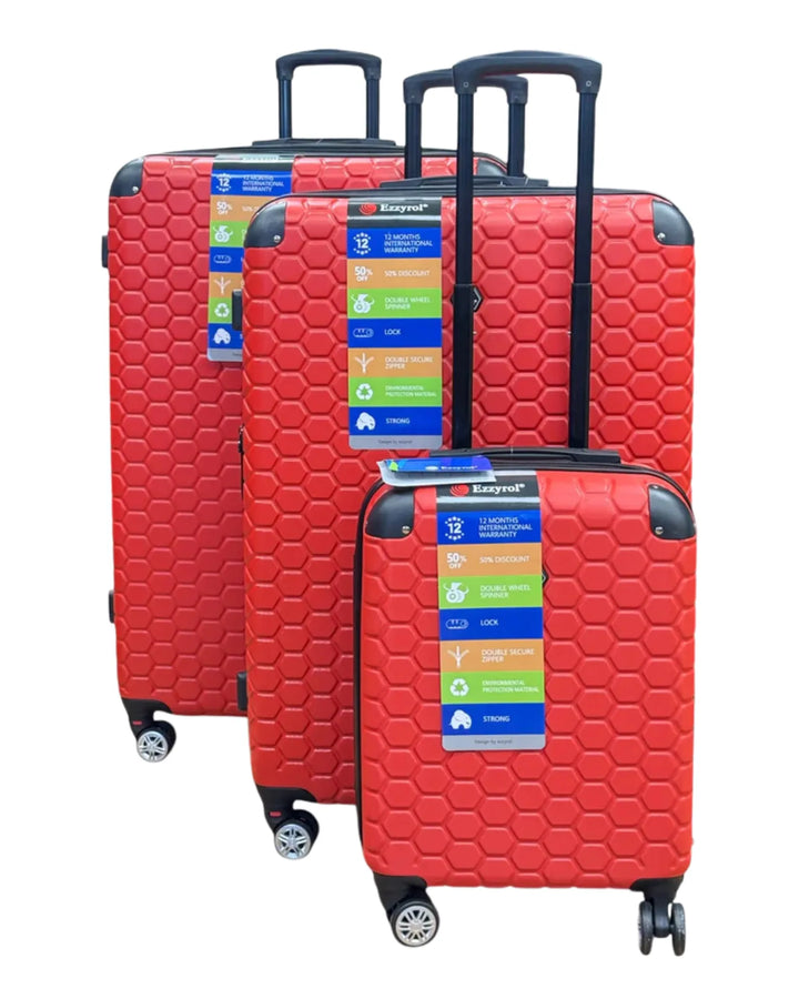 Set of red suitcases with labels on a white background