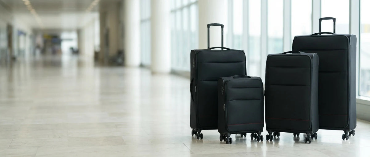 JustPack Aviate soft shell luggage set in an airport terminal