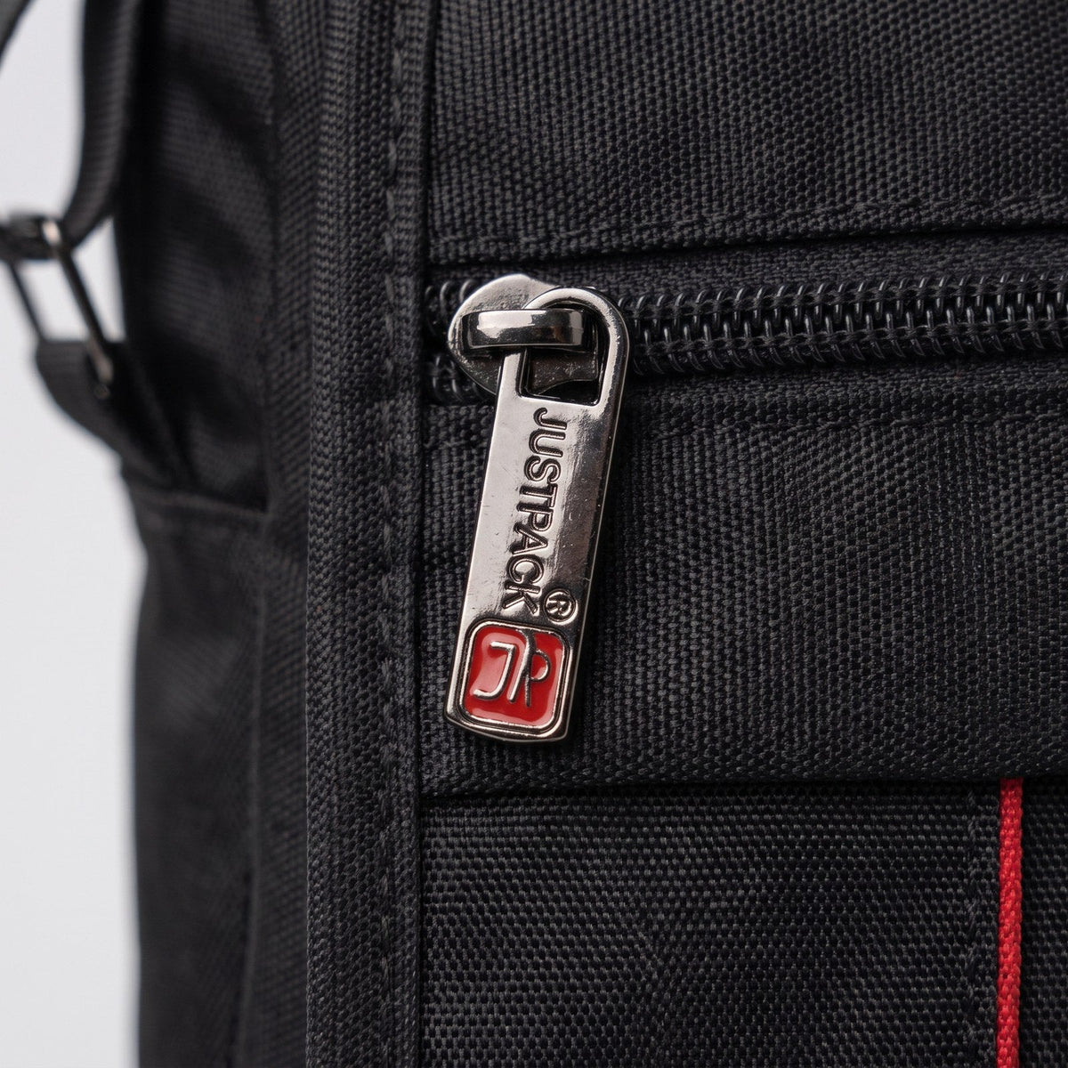 JUSTPACK Stripe flap-over crossbody bag, detail zip pull texture