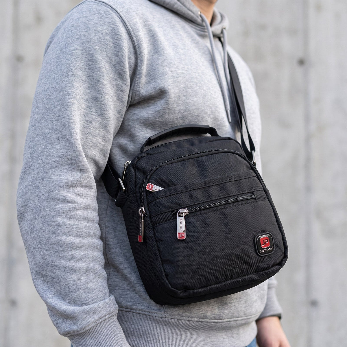 JUSTPACK Courier small crossbody, worn crossbody