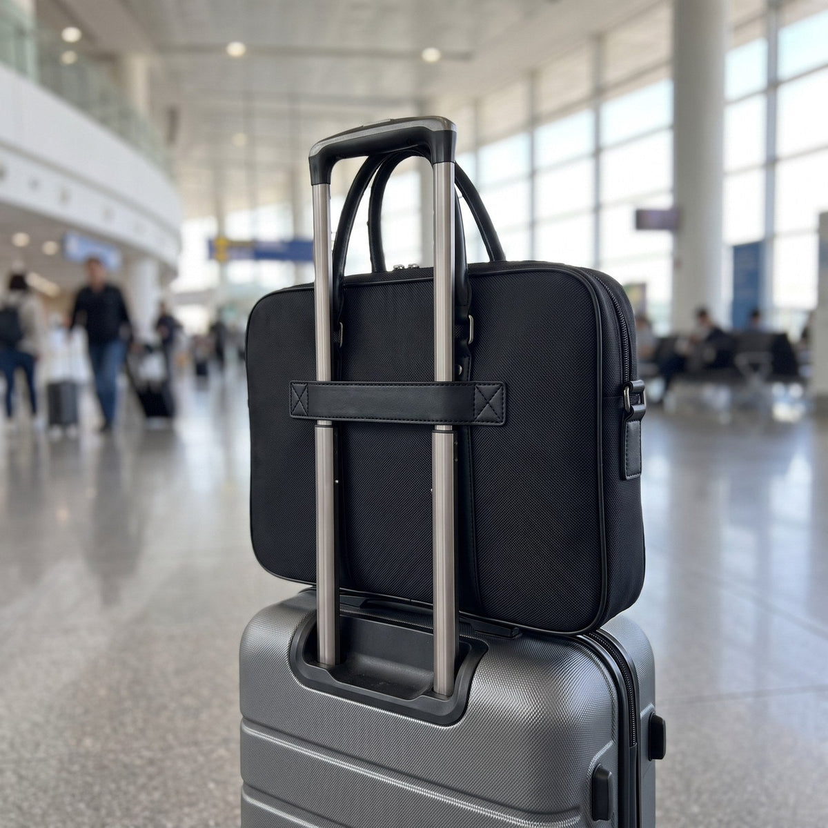 JUSTPACK Ledger laptop briefcase, on a roller suitcase