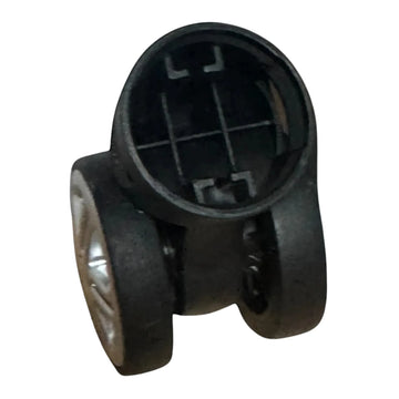 Black plastic component on a white background