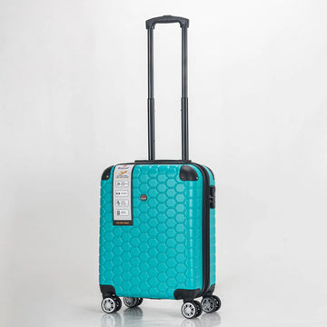 Teal suitcase with a honeycomb pattern on a light gray background