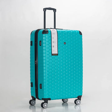 Turquoise suitcase with a honeycomb pattern on a light gray background