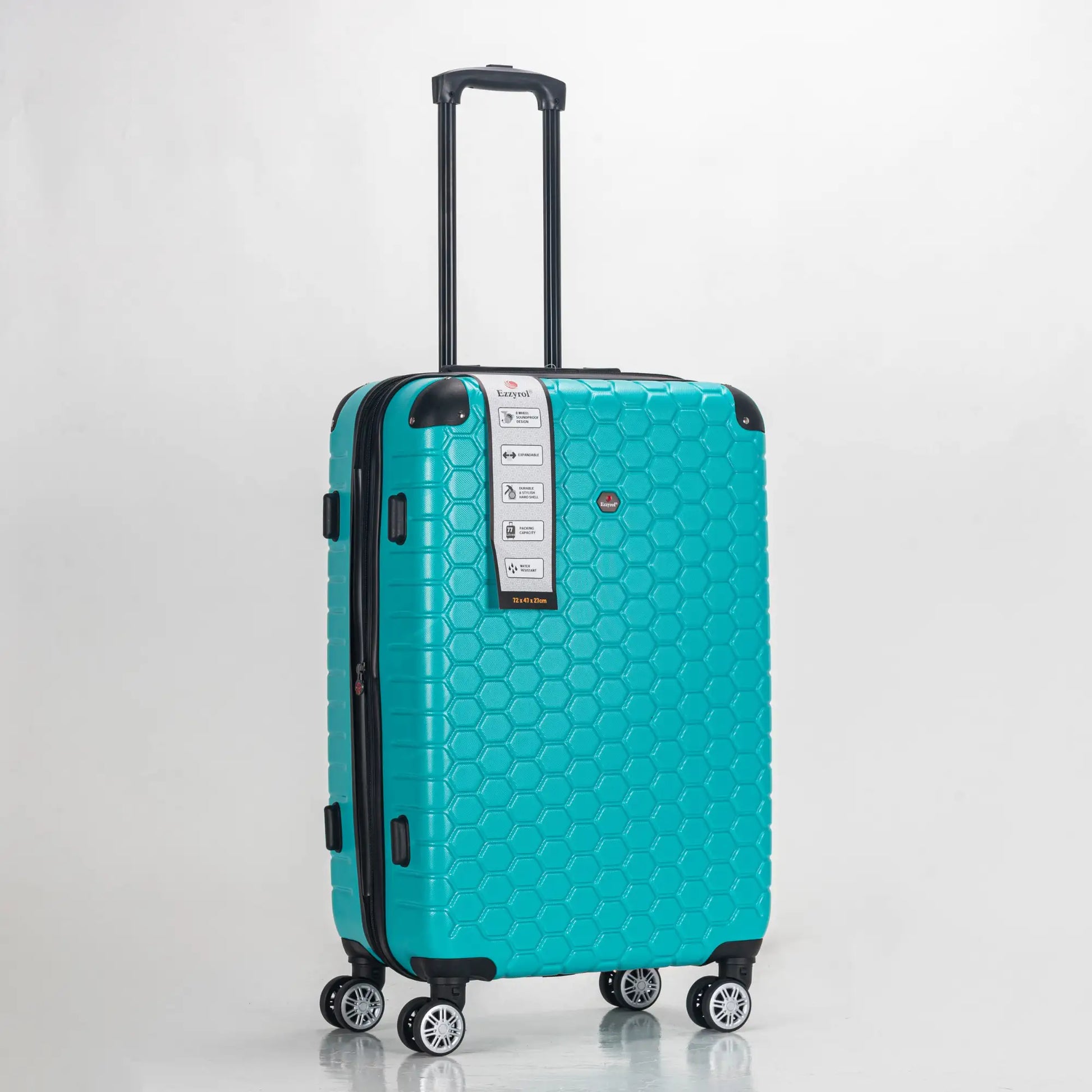 Turquoise suitcase with a honeycomb pattern on a light gray background