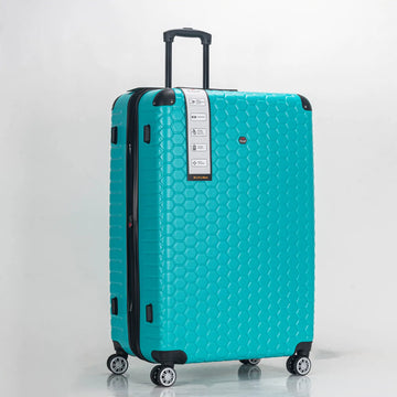 Turquoise suitcase with a honeycomb pattern on a light gray background