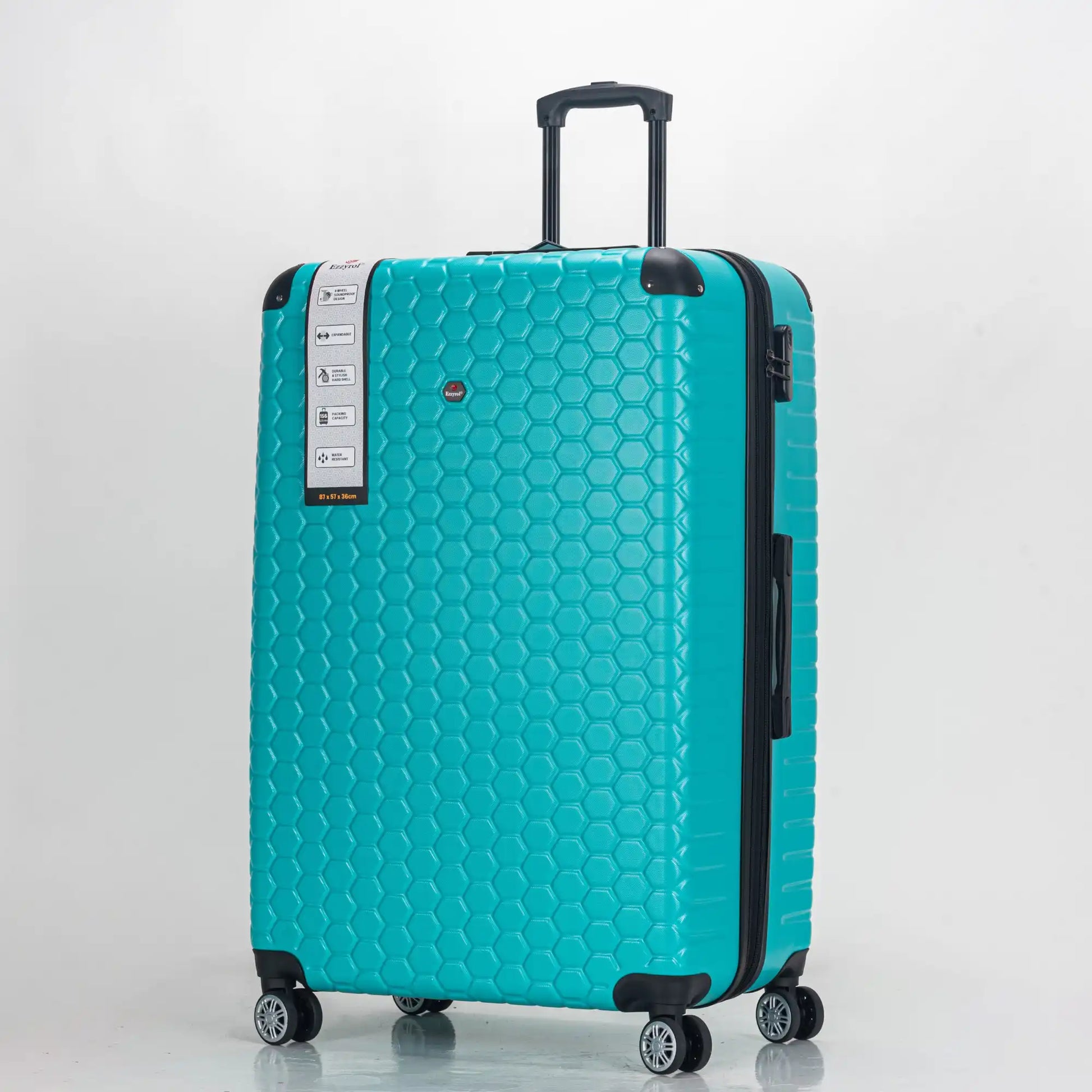 Turquoise suitcase with a honeycomb pattern on a white background