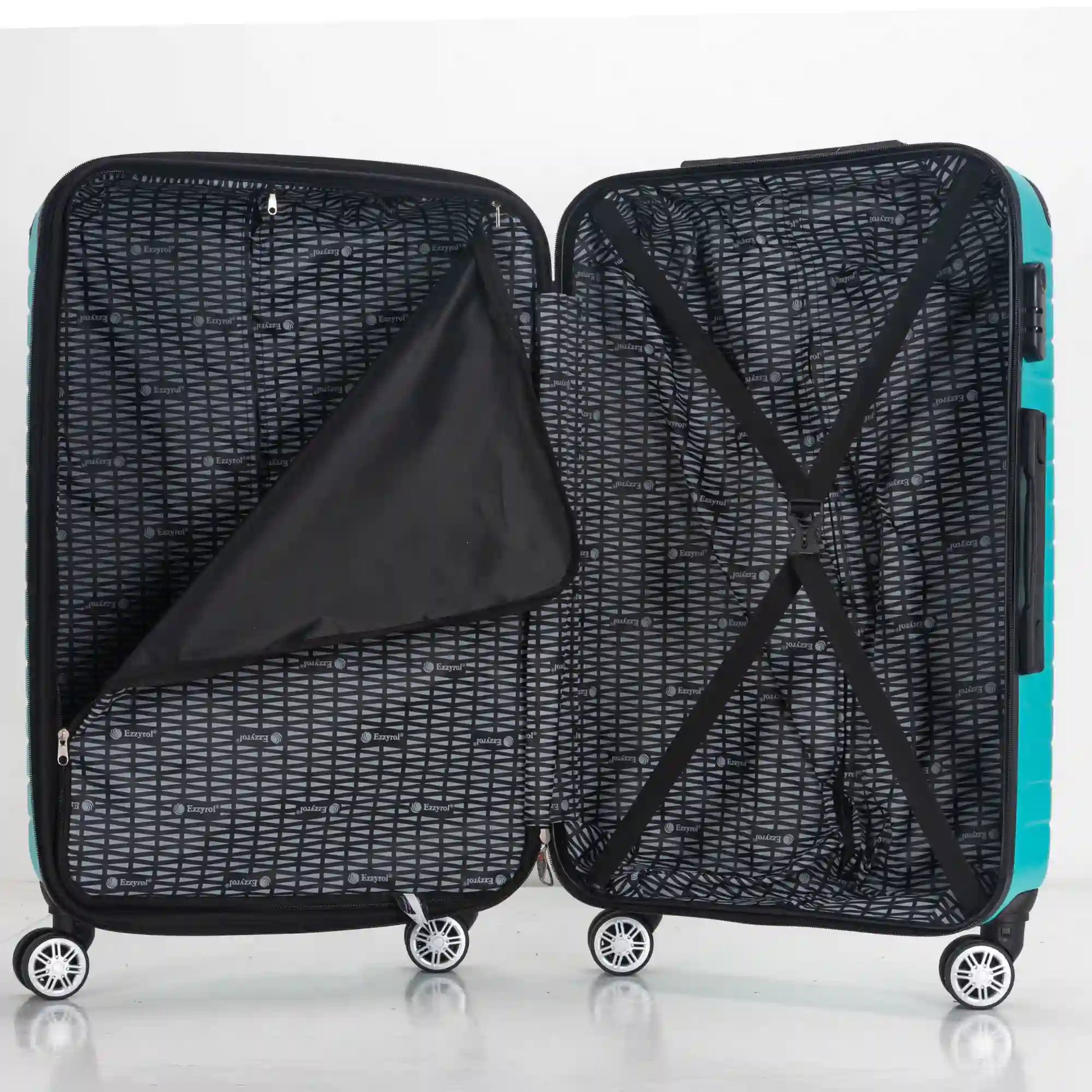 Open suitcase with a black garment bag inside on a white background