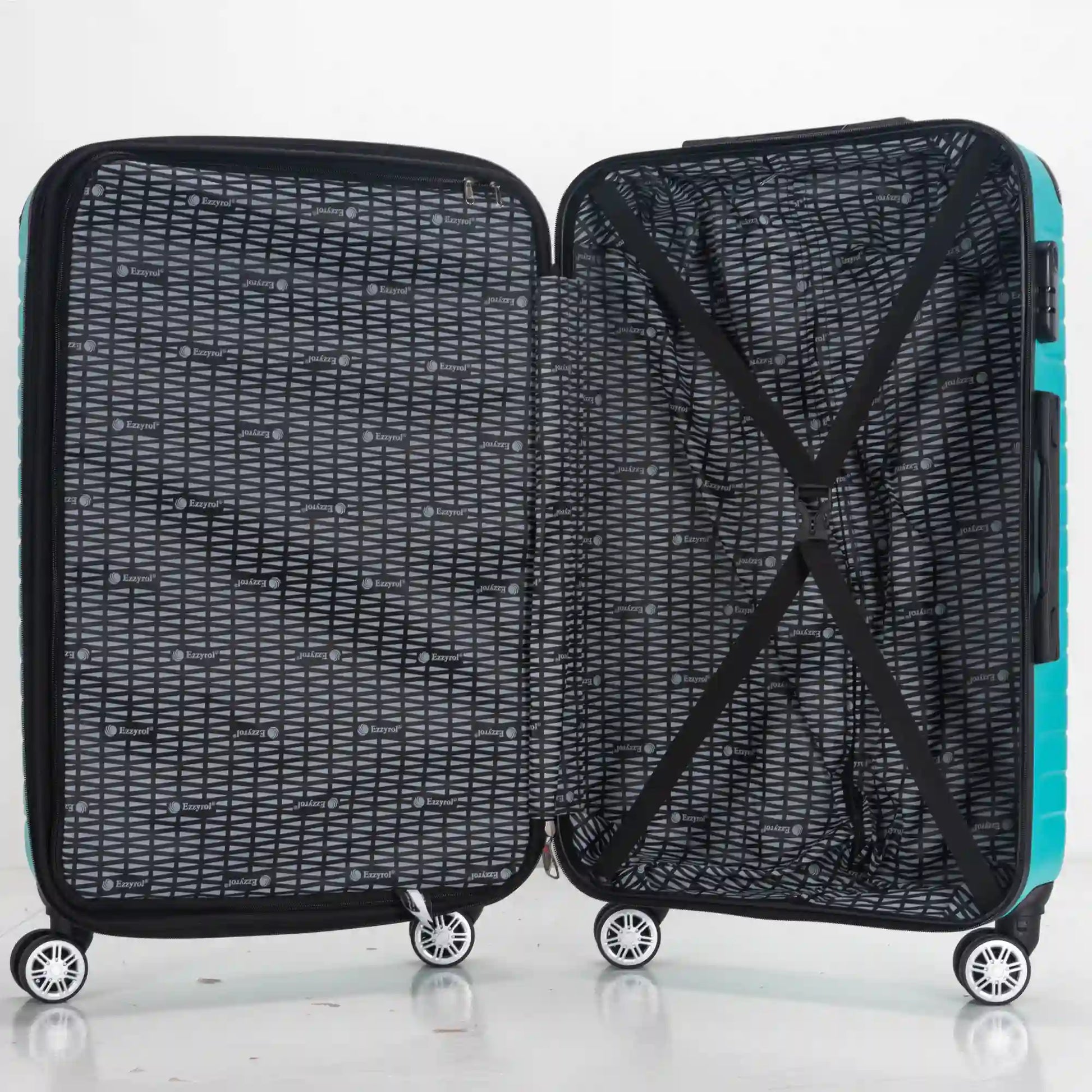 Open suitcase with black patterned interior on a white background