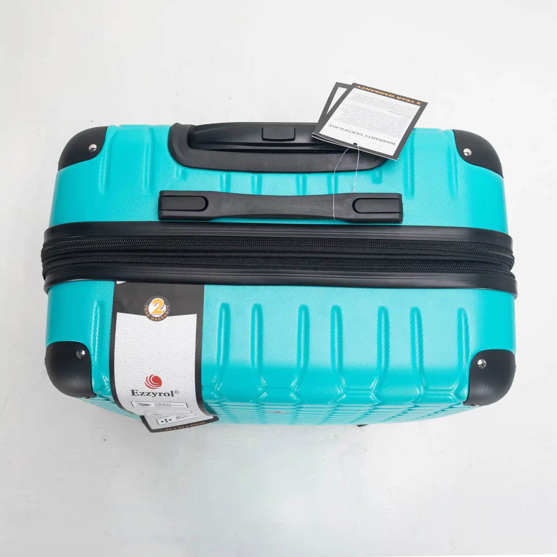 Turquoise suitcase with black handle and wheels on a white background