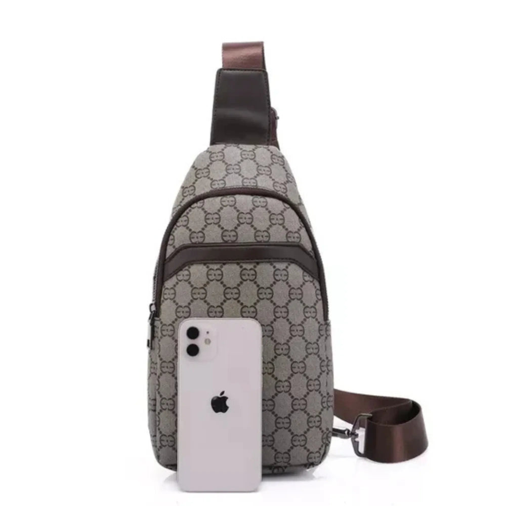 Gray patterned crossbody bag with a phone on a white background