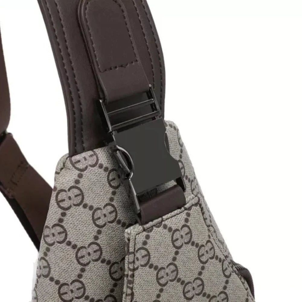 Close-up of a patterned bag with a brown strap on a white background