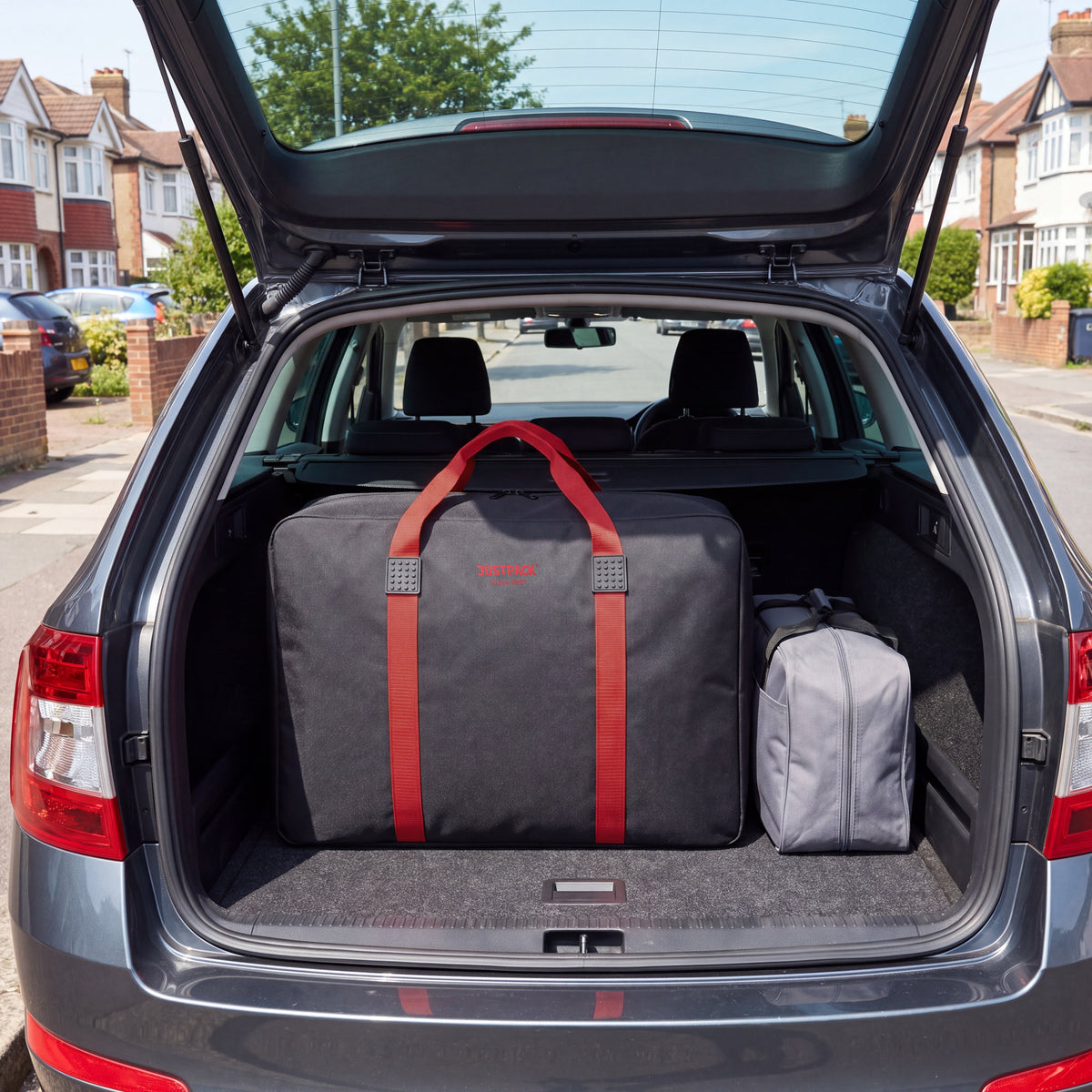 Black with Red Straps Stowaway in a car boot
