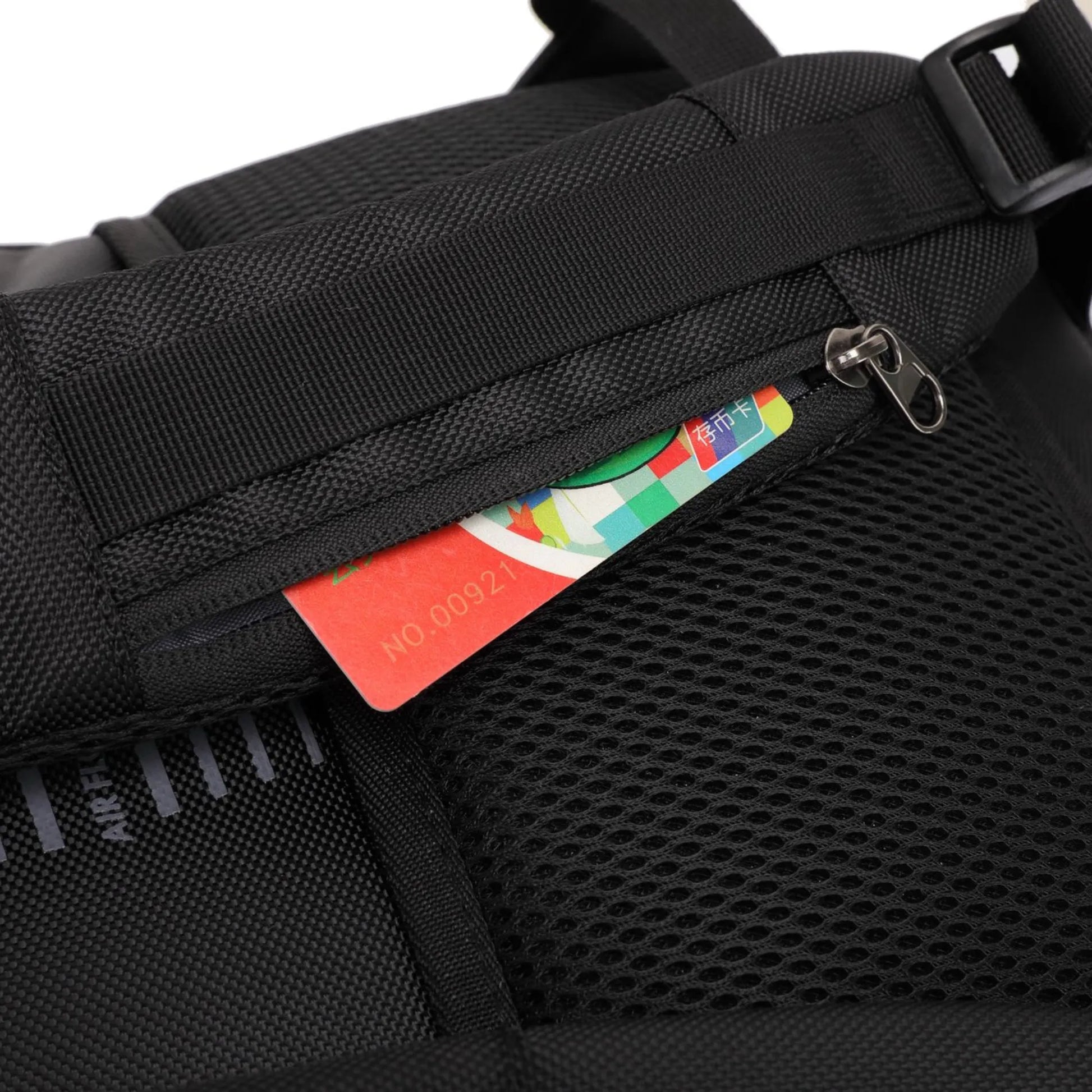 Black backpack with a card holder showing colorful cards.