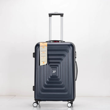 Dark blue suitcase with a visible brand logo on a white background