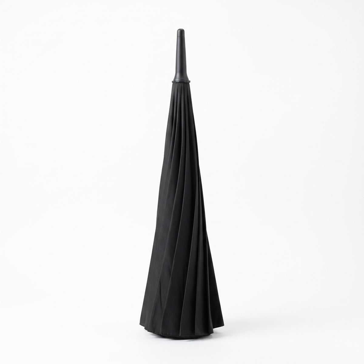 Ezzyrol Sovereign long stick umbrella in black standing closed with the canopy gathered