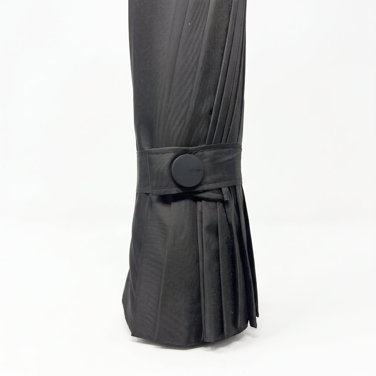 Close-up of the hook and loop strap holding the black Ezzyrol Sovereign closed