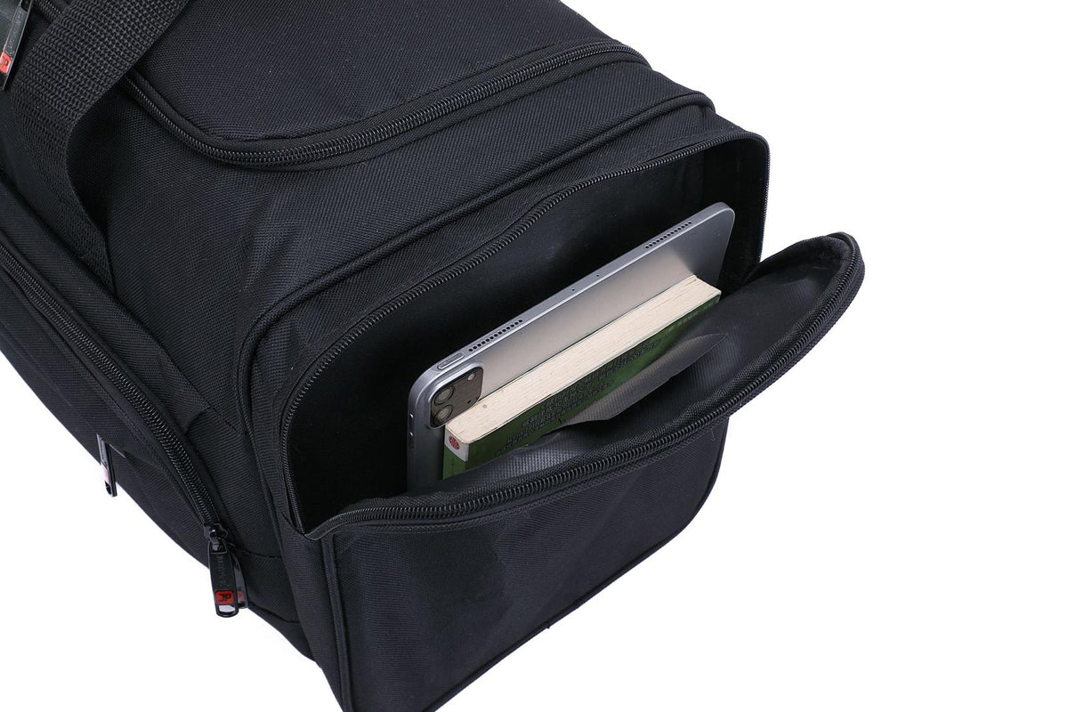 Close-up of the end pocket on the JustPack duffel holdall holding a tablet and a notebook