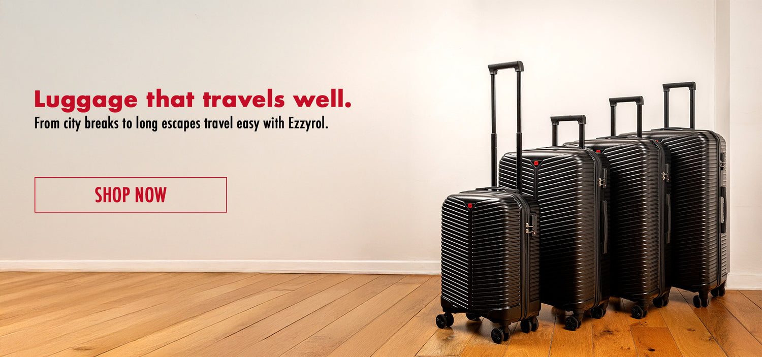 Set of black suitcases on a wooden floor with promotional text and call to action.