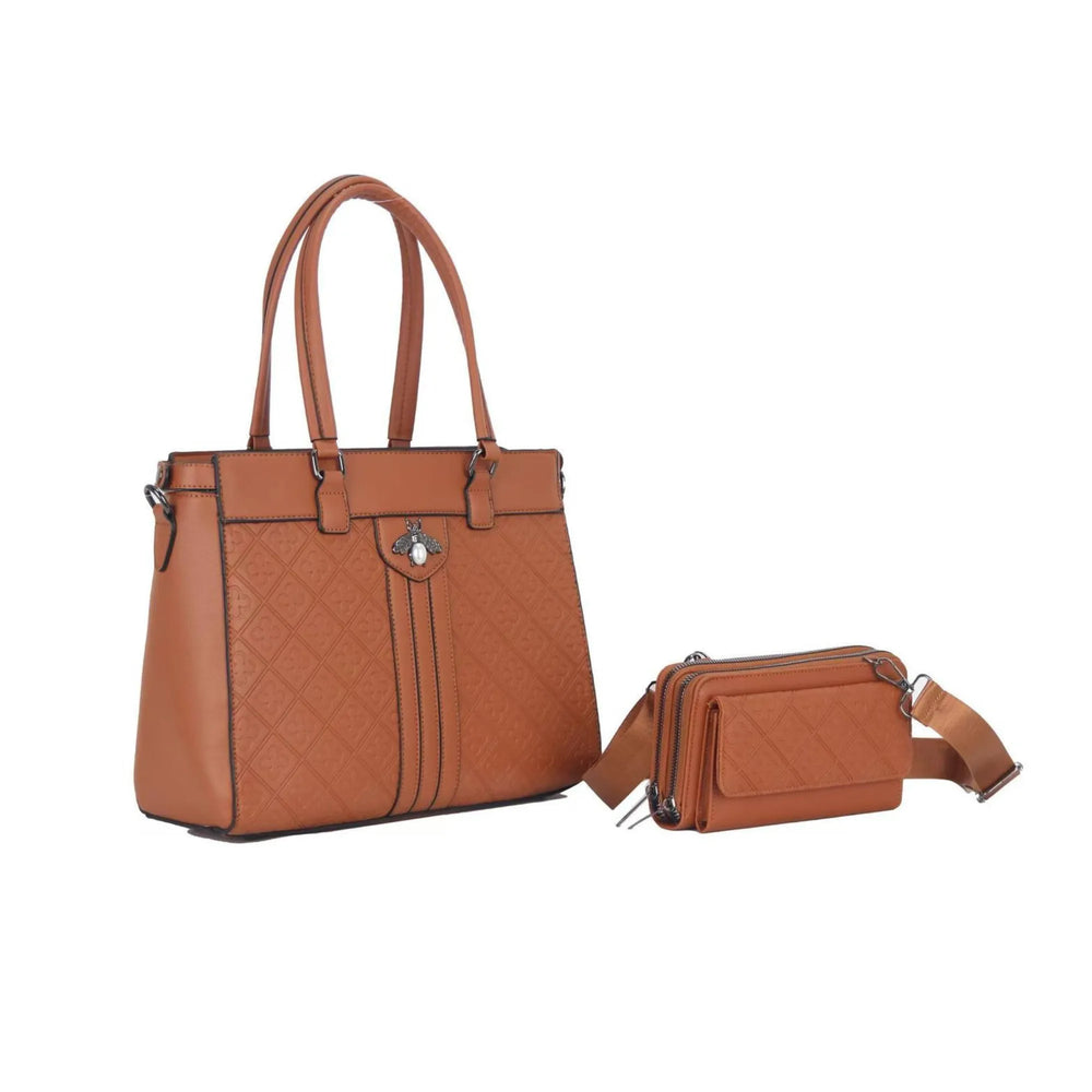 Brown leather handbag and matching crossbody bag on a white background