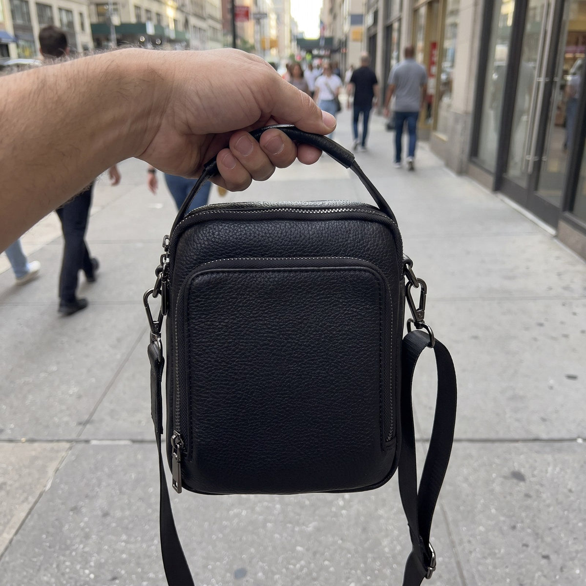 JUSTPACK Twofold crossbody bag, carried by handle