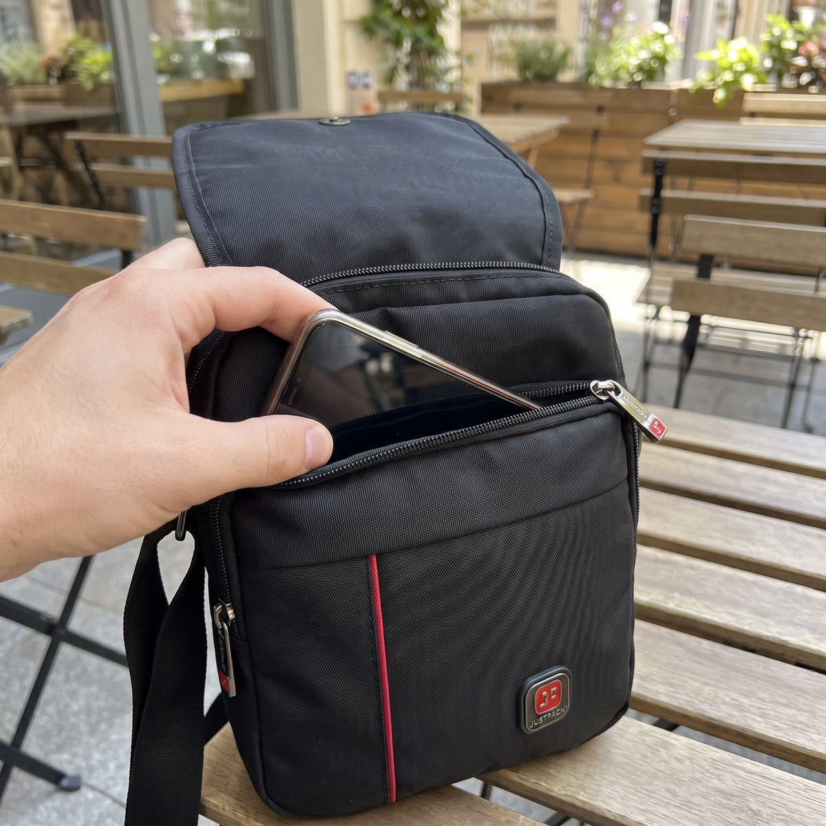 JUSTPACK Stripe flap-over crossbody bag, use case accessing bag