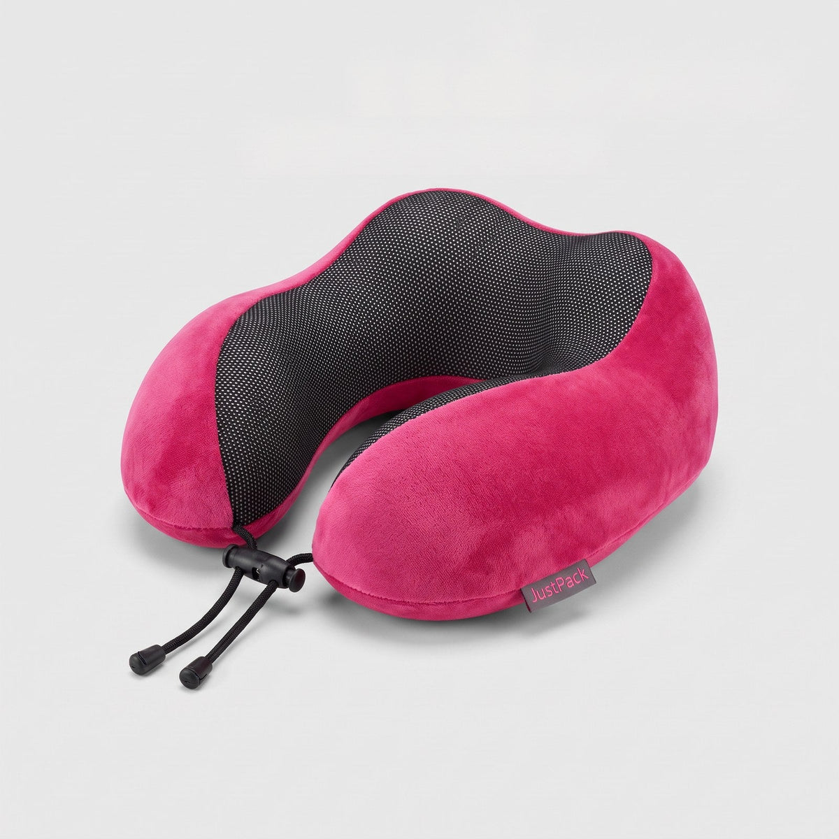 JUSTPACK Drift travel neck pillow in hot pink, three quarter view