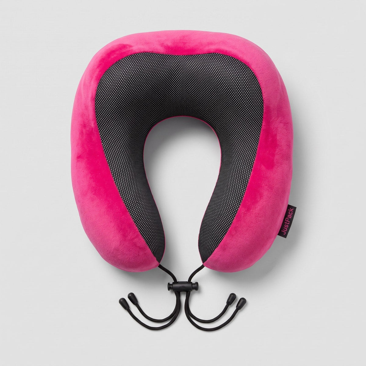 JUSTPACK Drift travel neck pillow in hot pink, top down view