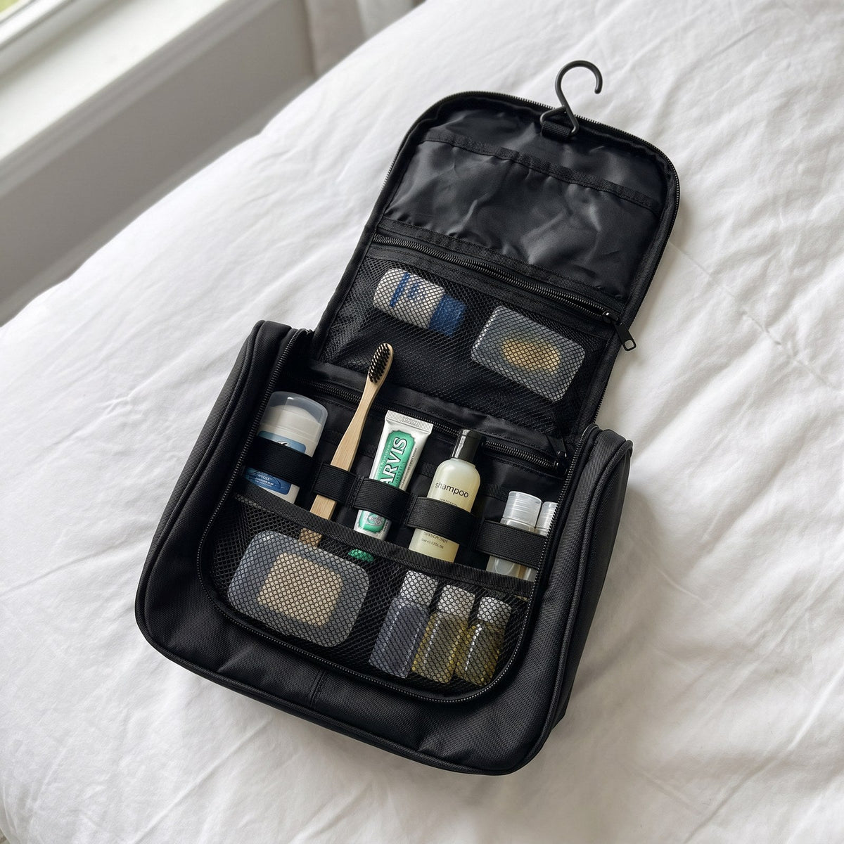 JUSTPACK Hook hanging toiletry bag, packed for travel