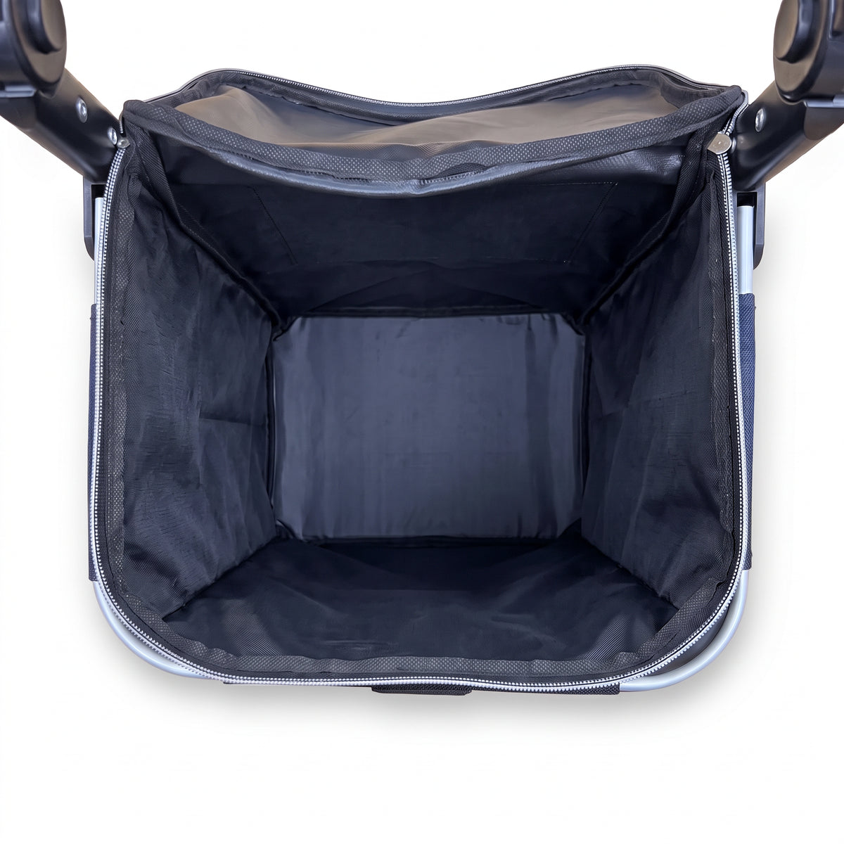 Inside the empty main compartment of the Ezzyrol 74L shopping trolley, navy lining