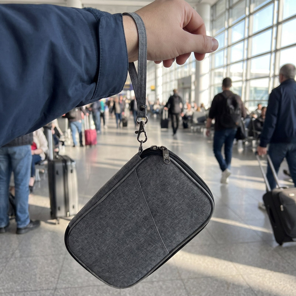 JUSTPACK Docket travel document organiser, wrist strap in use